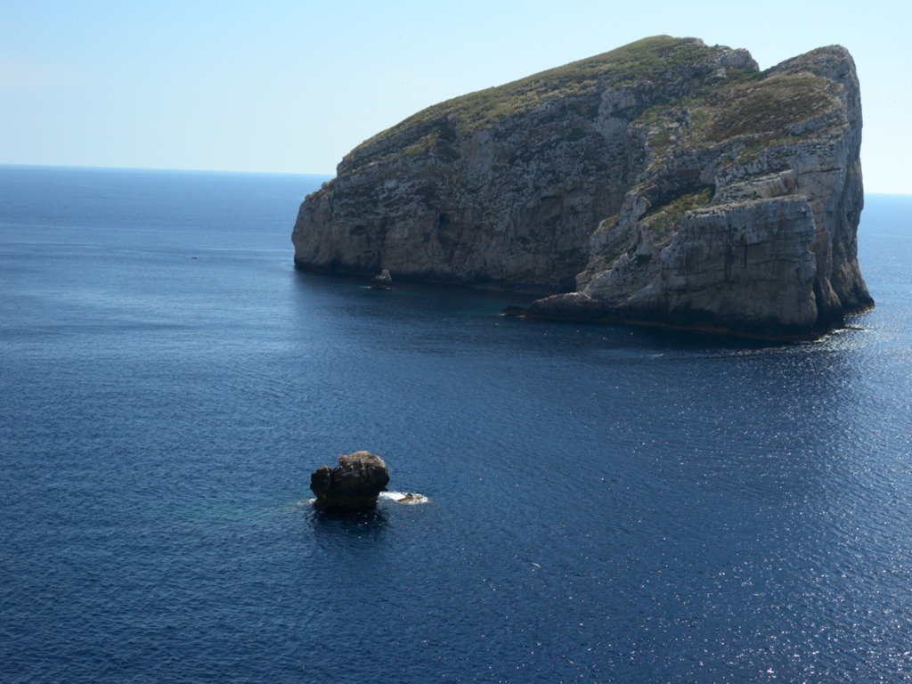 From the cliff of Capo Caccia is the breathtaking panorama to opposite 182 m high island of Foradada.