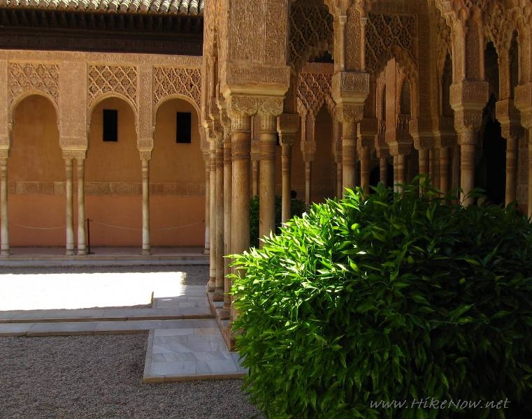 Arches around Patio of the Lions in the heart of the Alhambra, the Moorish citadel - Granada Spain 