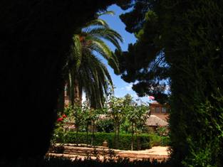 Visitors enjoy view to gardens of  Alhambra gardens