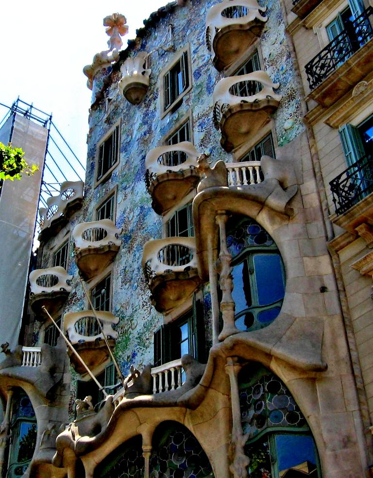 The building of Casa Batllo looks very remarkable - like everything Gaud designed - Barcelona , Spain 