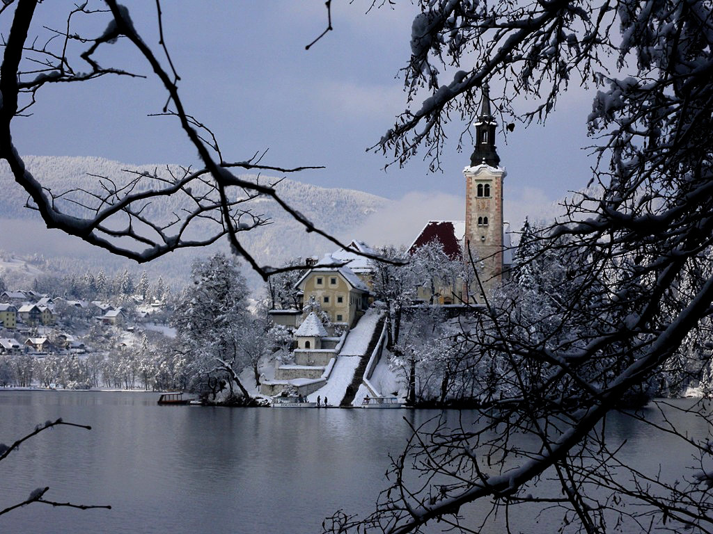 Boat trip to the church of the Lake Bled island - Slovenia in winter 