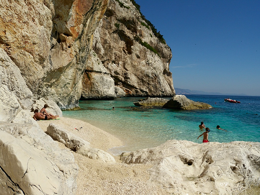 Sunbathing in small beaches of Orosei Gulf - Cala Mariolu - Sardinia Italy 