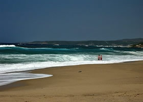 On the beach of Costa Verde - Piscinas