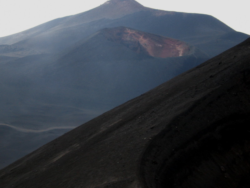 The summit of Mount Etna with craters looks like moon landscape - Sicily, Italy 