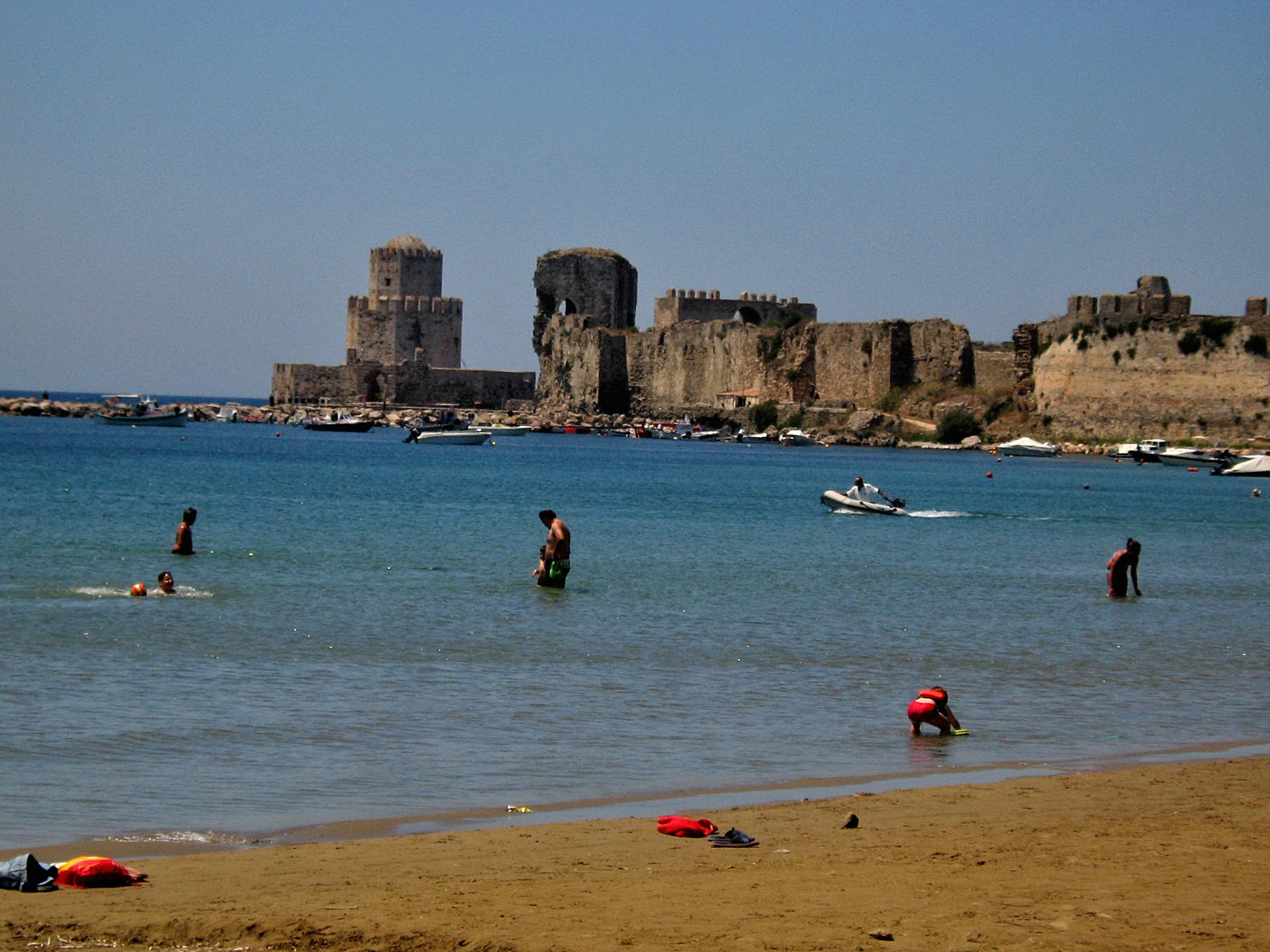 Methoni beach, around 10 km faraway from Pylos, and magnificent Bourtzi tower behind the beach which built the Turks in the 16th Century - Methoni Greece 