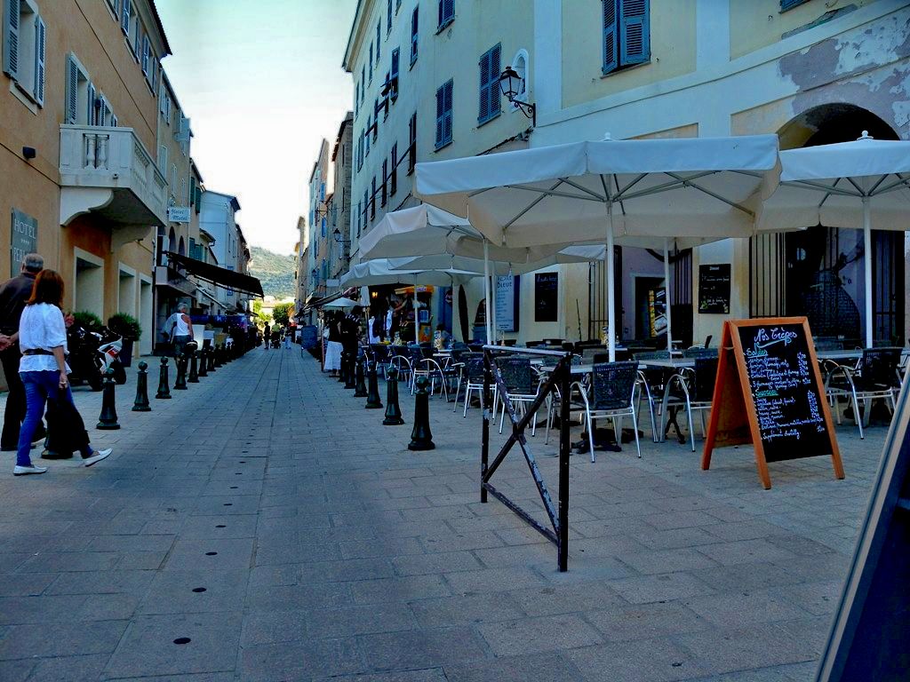 Strolling in the evening through the streets of L 'Ile Rousse - Corsica