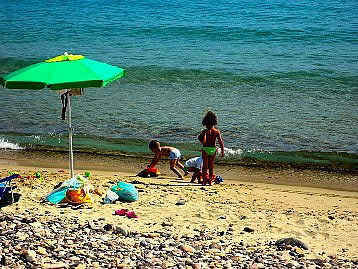 Children in Marina di Gairo  beach - Sardinia