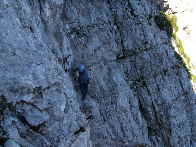 Secured and attractive ferrata trails leads up along exposed ledges and steep ravines of north wall of Mt. Mala Mojstrovka - Slovenia 