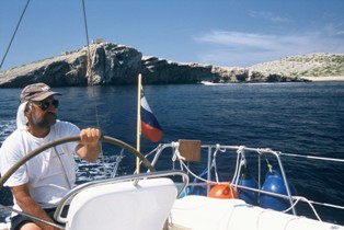 Exploring island of Adriatic Sea with a sailing boat