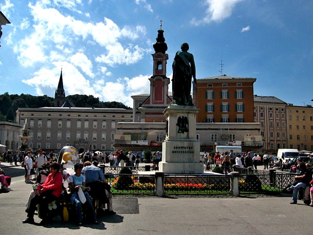 Listening of Mozart's music in the city center of Salzburg - Austria 