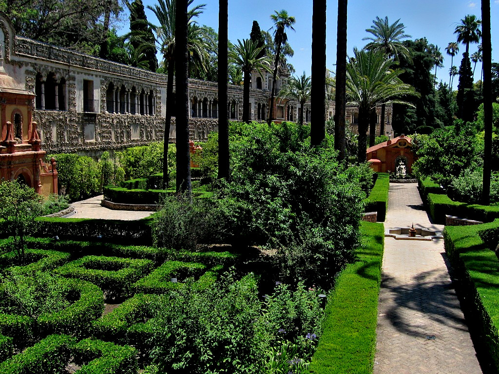 Alcazar of Seville has the planting of palm, cypress, myrtle, mulberries, magnolia, orange and lemon trees - Spain 