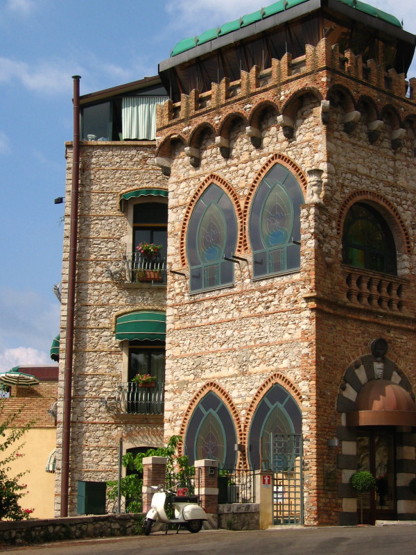 The old town of Taormina is dotted with fine palazzi - most of it are Gothic with Arab Norman inflections - Italy