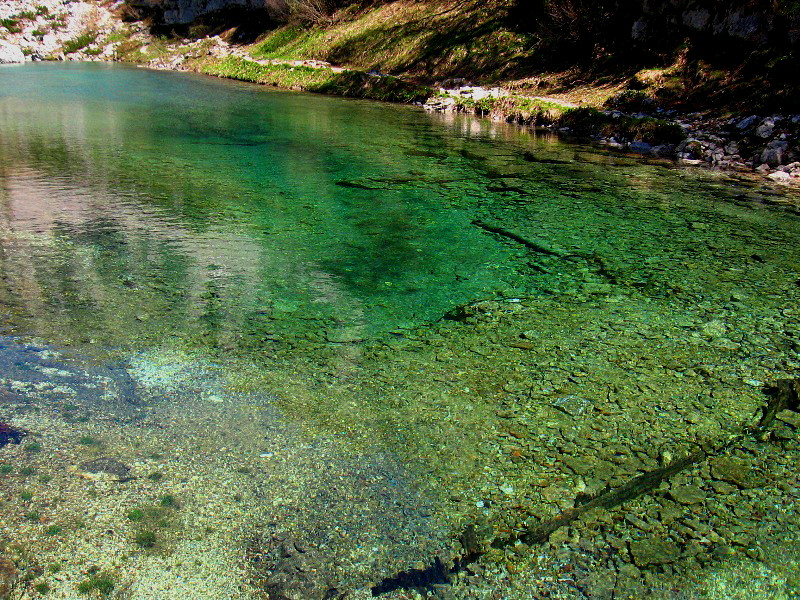 Artificial lake Mocivec below the walls of mt. Ticarica, Seven Triglav Lakes valley - Slovenia 