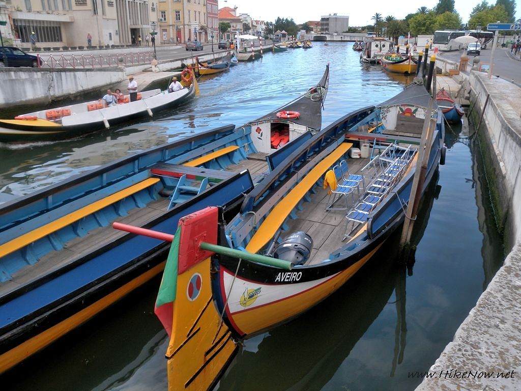 the canal is dotted with a number of moliceiros, traditional fishing boats in Aveiro - Portugal 