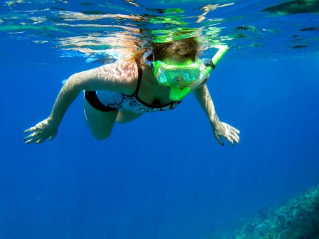 Exuma island snorkeler Bahamas