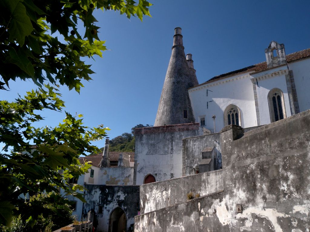 The Royal Palace, Sintra - from the kitchen of Royal palace, which is nestled deep in the building, rises the two giant conical chimneys 