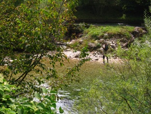 Fisherman on Radovna river Slovenia