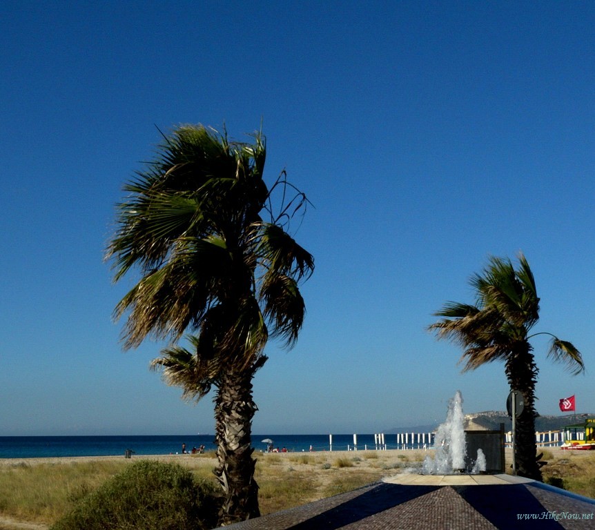 Poetto beach is just 5 Km from the city of Cagliari, white sandy beach attracts thousands of locals, as well as tourists - Cagliari Sardinia, Italy 