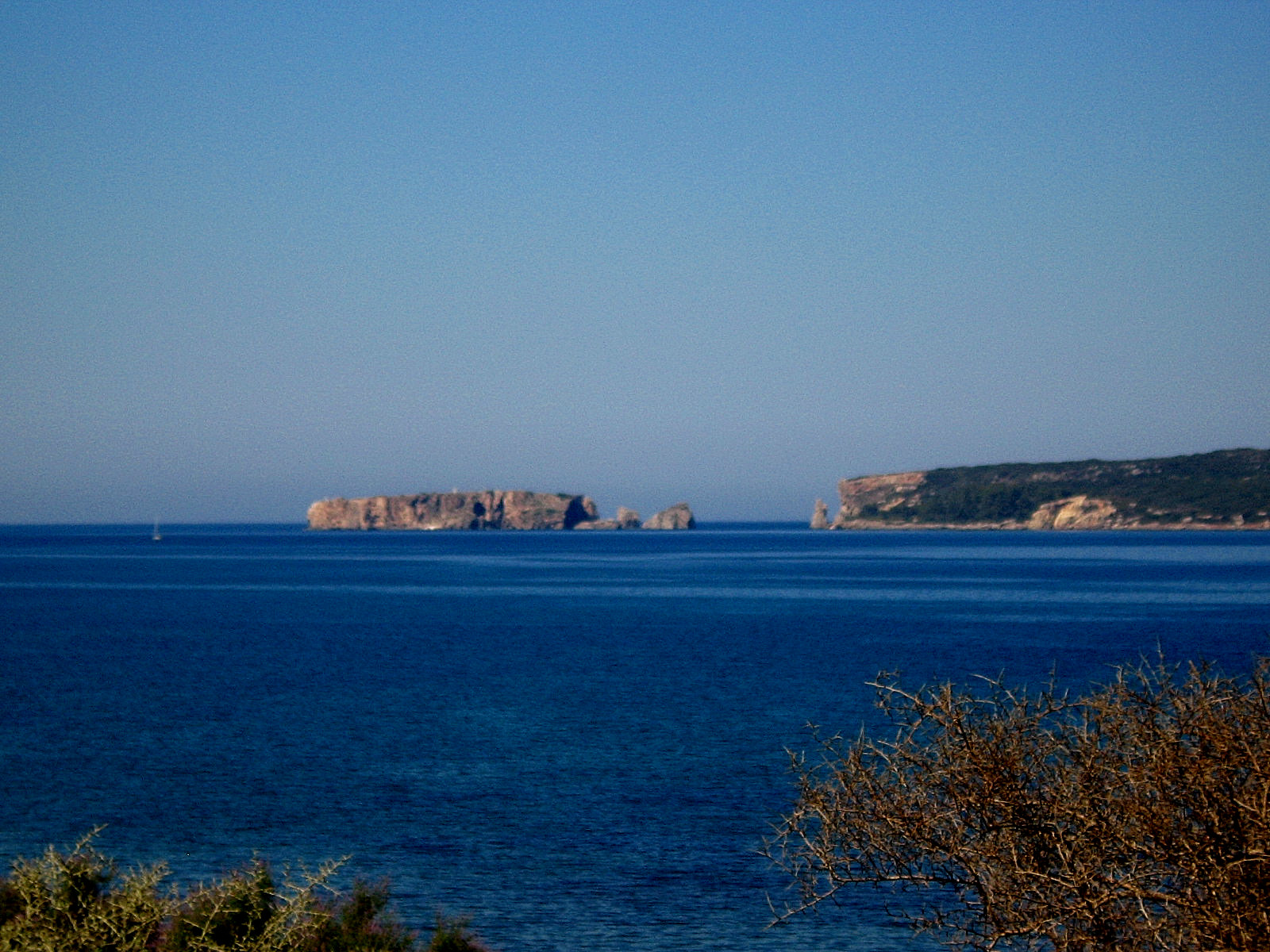 Pylos has a nice landscape with white houses nested along the hill, it is known by battle of Navarino in 1827 and battle in 425 BC during the Peloponnesian war - Pylos Greece 