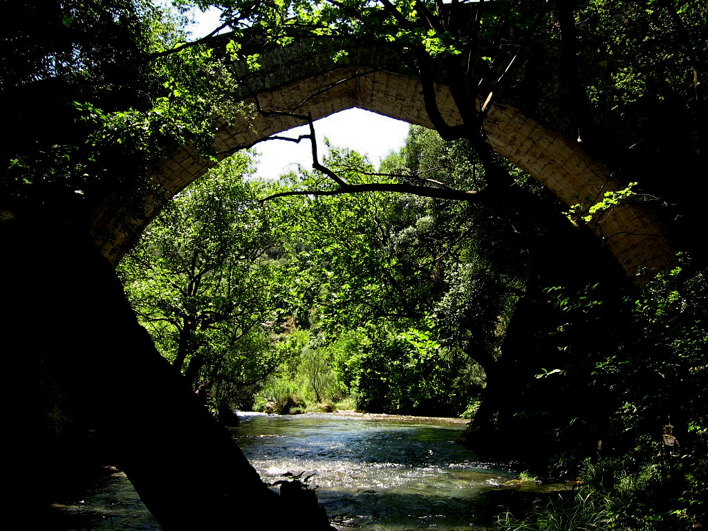 Lousios River is suitable for walking and other activities, at the stone bridge of Atsicholos, near Karytaina, descents path for rafting - Peloponnese Greece 