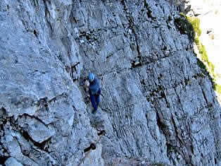 Climbing in Hanzova ferrata of Mala Mojstrovka crossing passage 