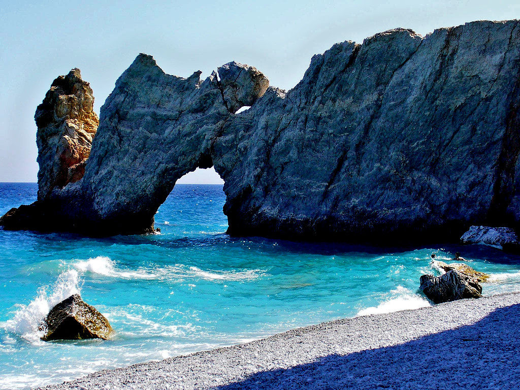 The beach and rock formation of Lalaria on Skiathos is accessible only by boat, take a day boat tour and enjoy sunbathing - Greece 