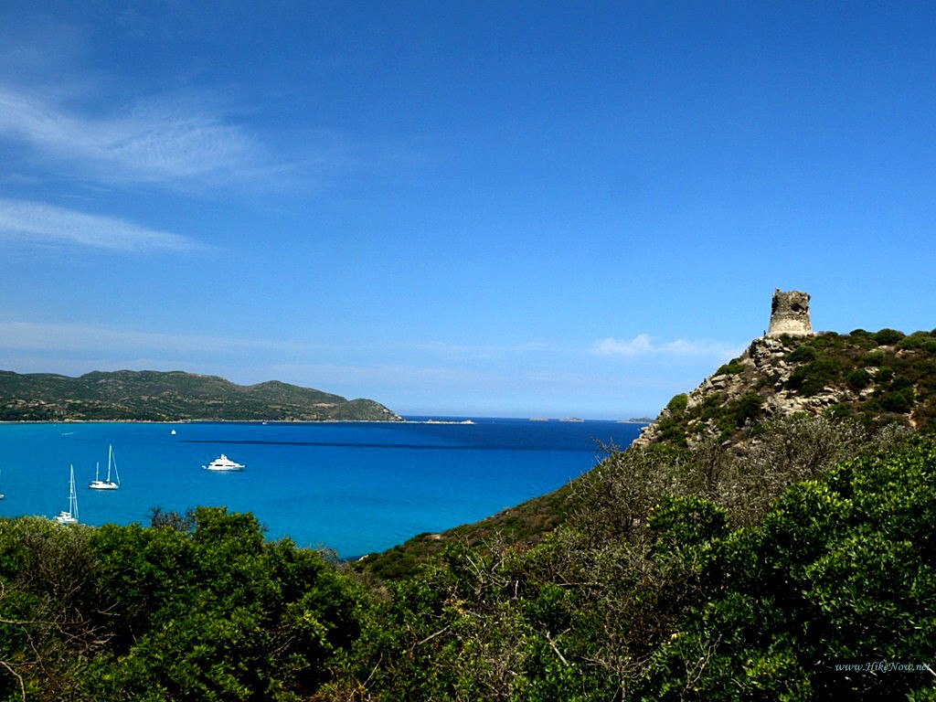 Nuraghe tower above Villasimius bay - Sardinia Italy 