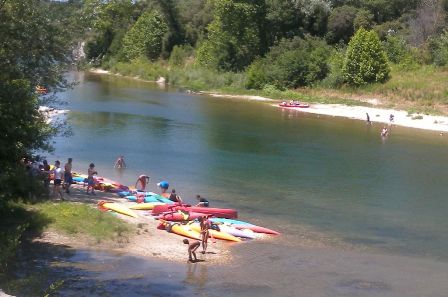 Pont du Gard aqueduct - sunbathing in river Gardon